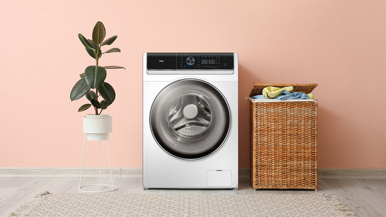 Washing machine and basket with laundry near color wall; Shutterstock ID 1886659504; Purchase Order: purchase_order